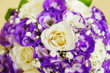 Gold rings on the wedding bouquet