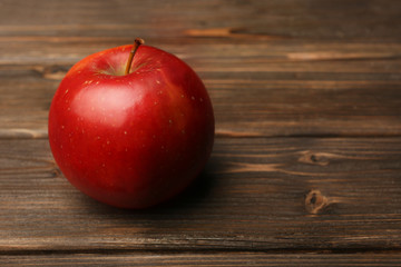 Apple on wooden background
