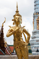 Golden Kinnari statue at the Thai Temple (Wat Phra Kaew)