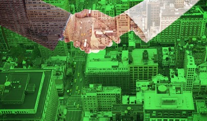 Shaking hands over eye glasses