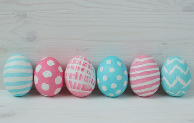 Easter eggs on a wooden background