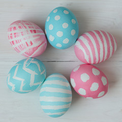 Easter eggs on a wooden background