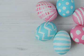 Easter eggs on a wooden background