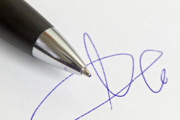 signature and pen