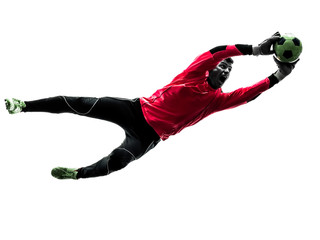 Obraz premium caucasian soccer player goalkeeper man catching ball silhouette