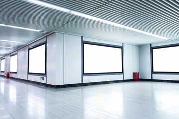 Blank billboard on the wall in corridor