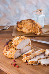 Roasted turkey breast on wooden plank