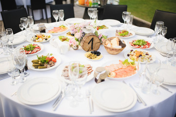 Banquet wedding table setting on evening reception