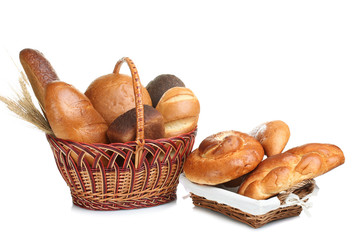 two baskets of rolls and bread on isolated background