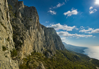 high rocks at sunrise near sea