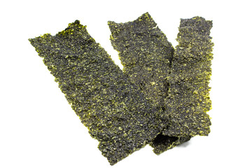 Several strips of dried seaweed sheets isolated on a white backg © Art_Photo