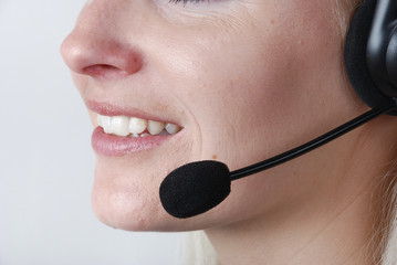 Portrait of young woman with headset