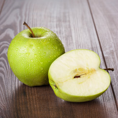 fresh green apples on the table