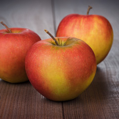 fresh red apples on the table