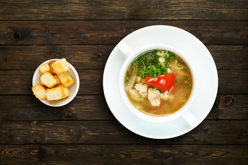 Restaurant food - white fish soup with croutons