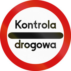 Passing without stopping prohibited road sign with the words: Police control in Polish