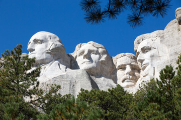 Presidents on Mount Rushmore framed by trees