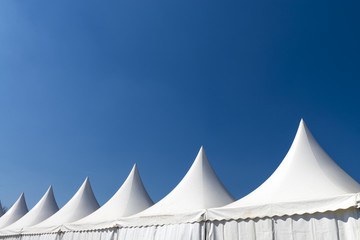 White tent on blue sky © Francesco