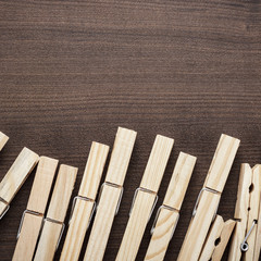 wooden clothes pegs on the table