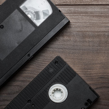 old retro video tape on wooden background
