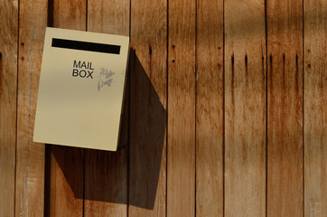 Mail box on wood background