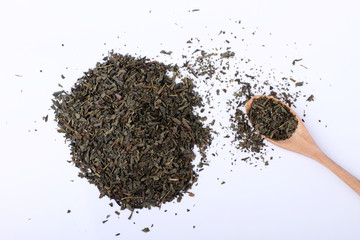 Green tea on wooden spoon