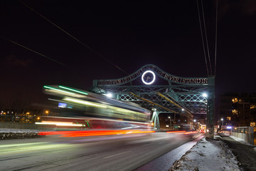 Fototapeta na wymiar Bridge and Streetcar in Toronto at Night