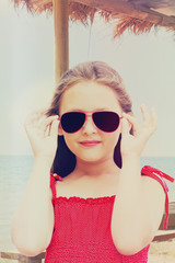 little girl in sunglasses