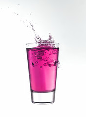 Splash in a glass of pink lemonade
