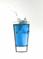 Splash in a glass of blue lemonade