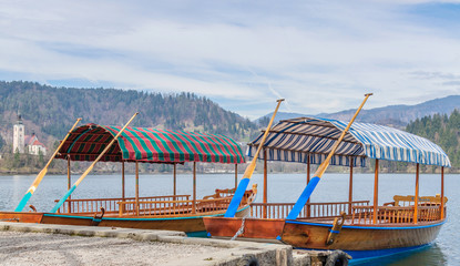 Boats on lake Bled with Church behind