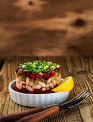 Beetroot and white been salad with pickles..
