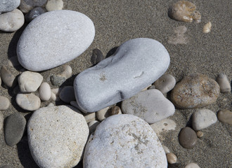 Fototapeta na wymiar beach rocks sand sea details