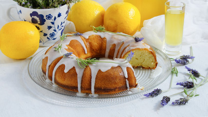 Obraz na płótnie Canvas Lemon Cake with homemade limoncello and lavander