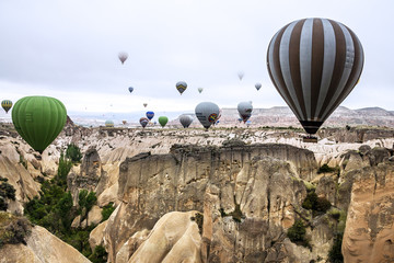 Goreme, Turkey. Mountain landscape. Hot air balloons in Cappadoc