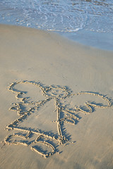 Engel in den Sand gemalt
