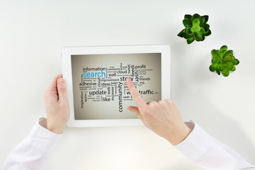 Word cloud in tablet. Search concept