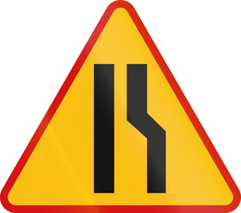 Polish sign indicating narrowing of the road only on the right
