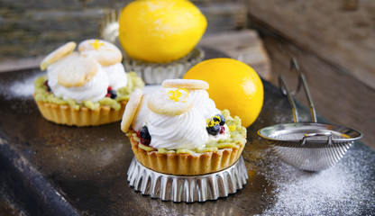 tartlets with cream, tea matcha curd and whisked egg whites