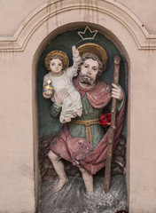 Saint Christopher - figurine of roadside shrines in Krakow - obrazy, fototapety, plakaty