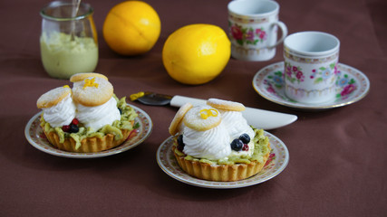 tartlets with cream, tea matcha curd and whisked egg whites
