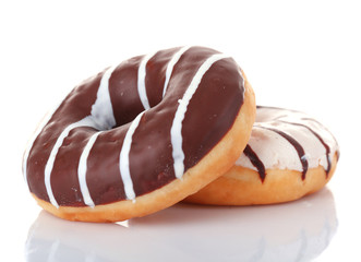 Delicious donuts with icing isolated on white