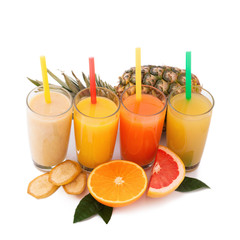 Tropical fruits and juice isolated on white