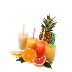 Tropical fruits and juice isolated on white