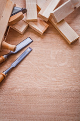 chisels old woodworkers plane and stack of wooden planks on boar