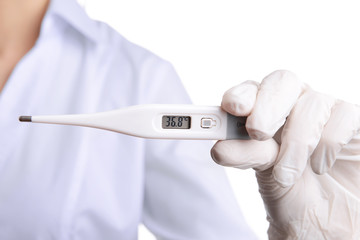 Doctor holding thermometer close up