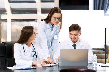 Medical workers working in conference room