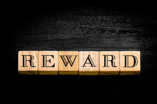 Word Reward isolated on black background