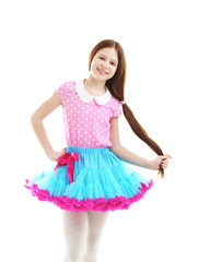 Beautiful little girl wearing cute pettiskirt, isolated on white