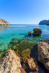 Turquoise water of Cala San Vicente beach, Majorca island, Spain